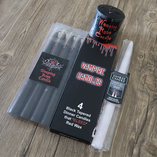 The dripping candles in their packaging before burning