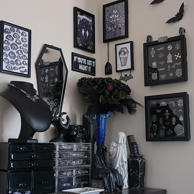 A gothic or spooky bedroom gallery wall