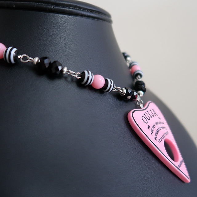 Ouija Planchette necklace (side view)