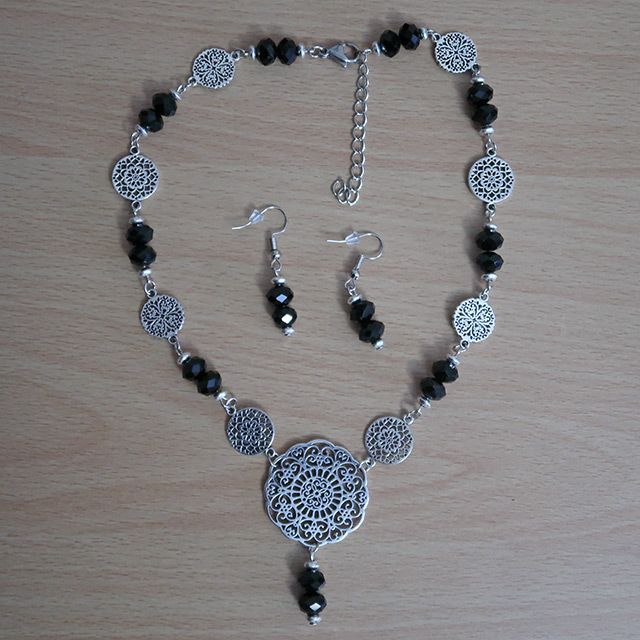 Floral Lace necklace and earrings (overhead view)