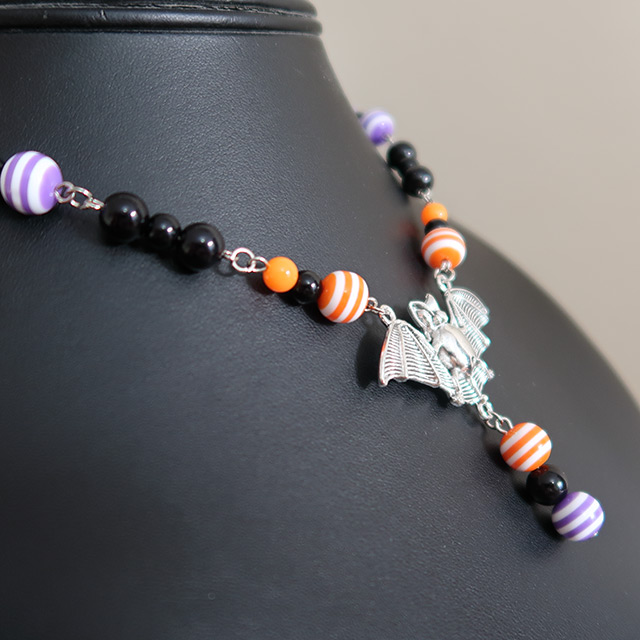 Striped Bat necklace (side view)