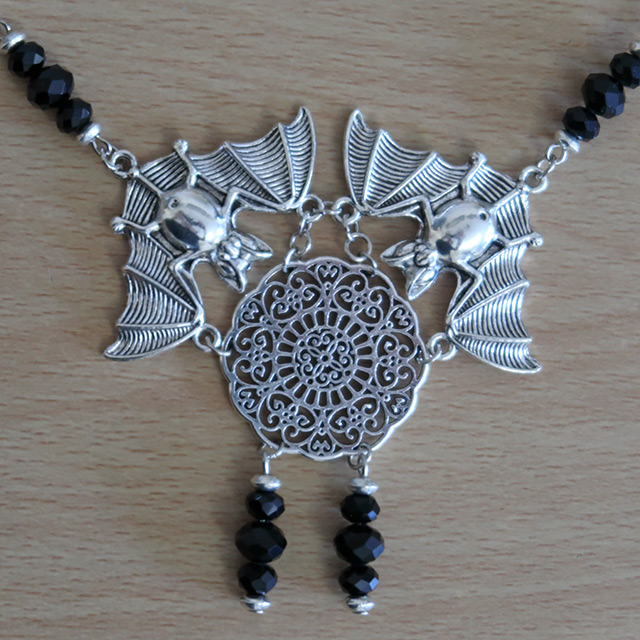 Floral Lace Bats necklace (detailed view)