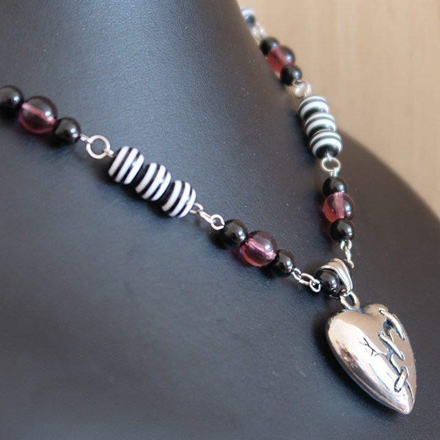 Broken Heart necklace (side view)
